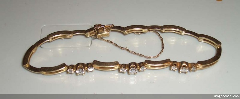 14 kt GOLD AND DIAMOND BRACELET ORIGINAL PRICE $1,630 .75 TCW DIAMONDS 